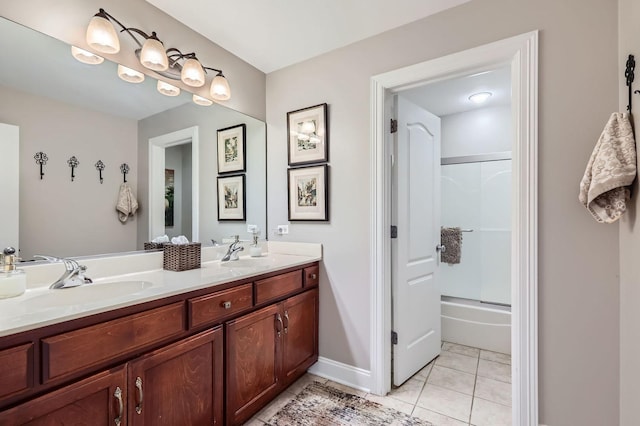 12740 Hawks Bill Ln, Plainfield, IL 60585 - full bathroom featuring double vanity, tile patterned floors, and shower / bath combination with glass door