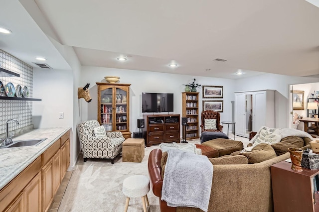 12740 Hawks Bill Ln, Plainfield, IL 60585 - living area featuring bar with sink and recessed lighting