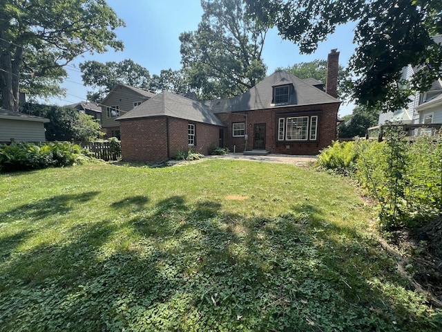 909 N Waiola Ave, La Grange Park, IL 60526 - back of property with brick siding and a chimney