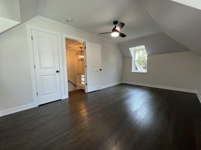 909 N Waiola Ave, La Grange Park, IL 60526 - bonus room with dark wood-style floors, lofted ceiling, a ceiling fan, and a chandelier