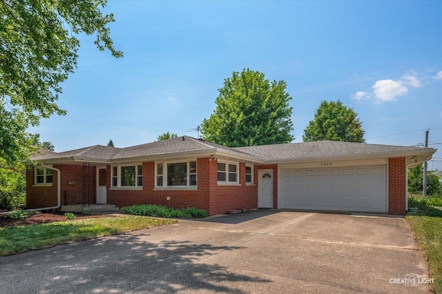 15418 S Pratt Ln, Plainfield, IL 60544 - ranch-style home featuring an attached garage, brick siding, concrete driveway, and a shingled roof