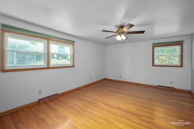 15418 S Pratt Ln, Plainfield, IL 60544 - unfurnished room with light wood finished floors and a ceiling fan