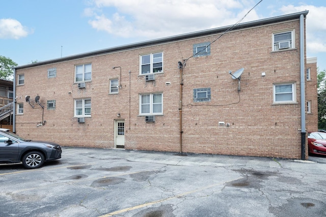 5457 W Edmunds St Unit 1A, Chicago, IL 60630 - rear view of property featuring brick siding