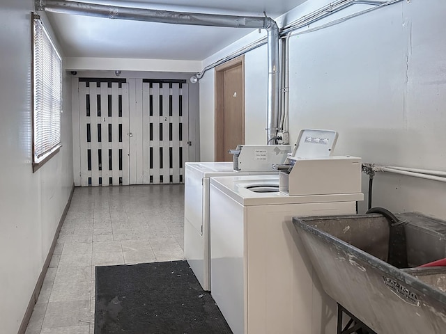 5457 W Edmunds St Unit 1A, Chicago, IL 60630 - community laundry room featuring washing machine and clothes dryer and light tile patterned flooring