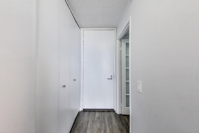 3660 N Lake Shore Dr Unit 3304, Chicago, IL 60613 - hallway with dark wood-style flooring and a textured ceiling