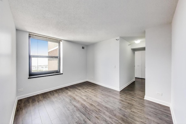 3660 N Lake Shore Dr Unit 3304, Chicago, IL 60613 - empty room with wood finished floors and a textured ceiling