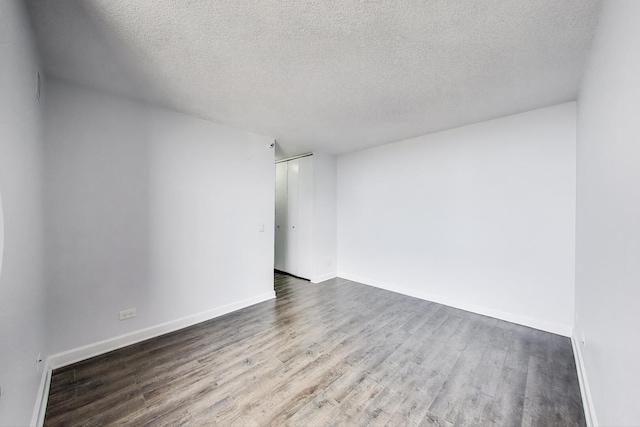 3660 N Lake Shore Dr Unit 3304, Chicago, IL 60613 - spare room featuring wood finished floors and a textured ceiling