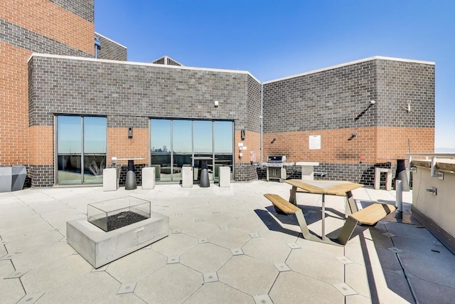 3660 N Lake Shore Dr Unit 3304, Chicago, IL 60613 - view of patio / terrace with an outdoor fire pit and outdoor dining area