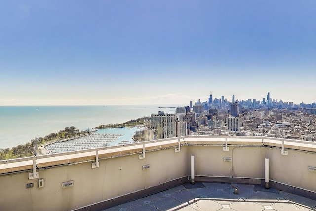 3660 N Lake Shore Dr Unit 3304, Chicago, IL 60613 - patio / terrace with a view of skyline and a water view