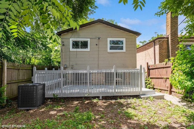 6545 S Hamilton Ave, Chicago, IL 60636 - rear view of house featuring a wooden deck and a fenced backyard