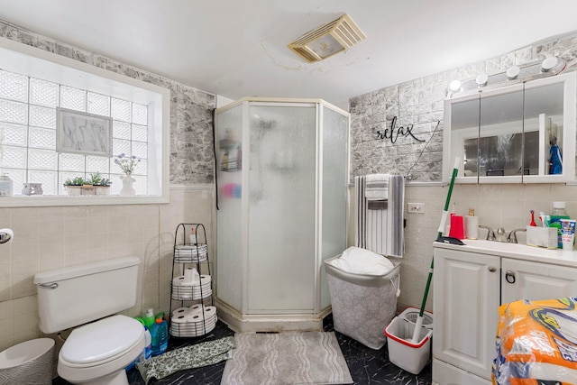 5121 W Henderson Ave, Chicago, IL 60641 - full bathroom featuring tile walls, vanity, a stall shower, radiator, and a wainscoted wall