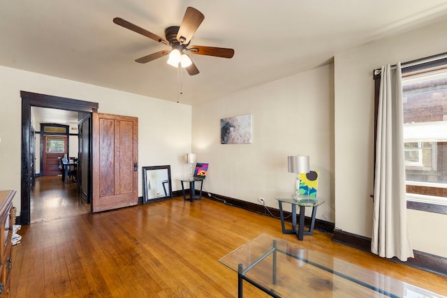 5121 W Henderson Ave, Chicago, IL 60641 - sitting room with dark wood finished floors and a ceiling fan