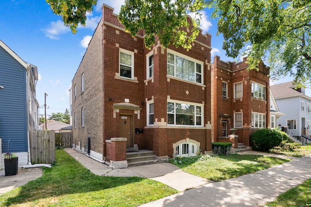 5121 W Henderson Ave, Chicago, IL 60641 - townhome / multi-family property featuring brick siding
