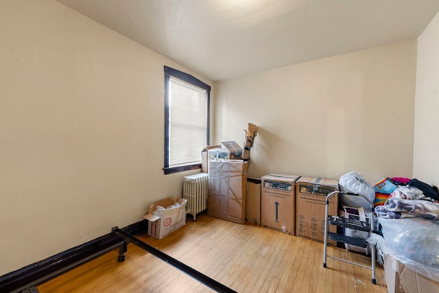 5121 W Henderson Ave, Chicago, IL 60641 - interior space featuring radiator and light wood-type flooring