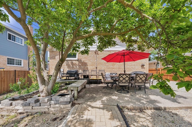 9519 Kolmar Ave, Skokie, IL 60076 - fenced backyard featuring a patio area and outdoor dining space