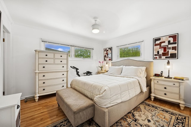 9519 Kolmar Ave, Skokie, IL 60076 - bedroom with wood finished floors and crown molding