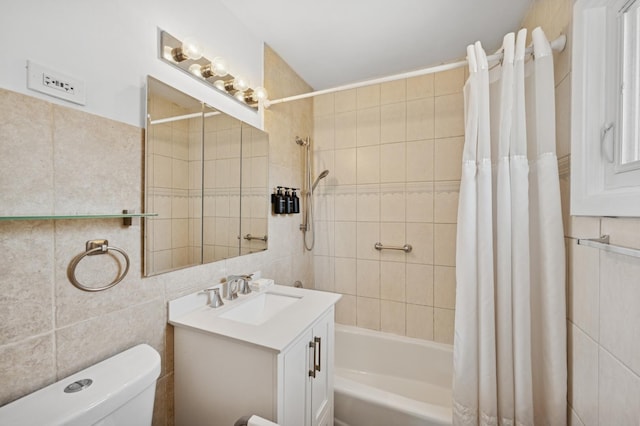 9519 Kolmar Ave, Skokie, IL 60076 - bathroom with shower / tub combo, vanity, and tile walls