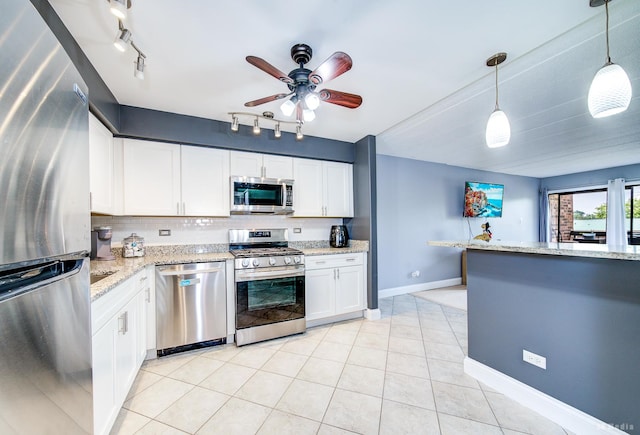 14620 Scarborough Ct Unit M2, Oak Forest, IL 60452 - kitchen with stainless steel appliances, track lighting, a ceiling fan, white cabinetry, and decorative light fixtures