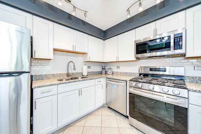 14620 Scarborough Ct Unit M2, Oak Forest, IL 60452 - kitchen featuring appliances with stainless steel finishes, white cabinets, decorative backsplash, and light tile patterned floors