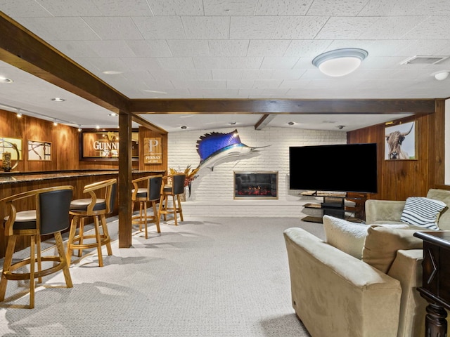 922 S School St, Mount Prospect, IL 60056 - carpeted living area with a bar and wooden walls