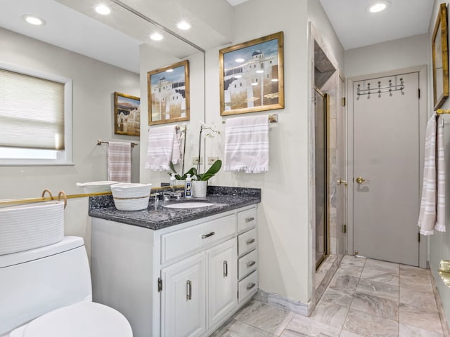 922 S School St, Mount Prospect, IL 60056 - full bathroom with vanity, marble finish floors, a shower stall, and recessed lighting