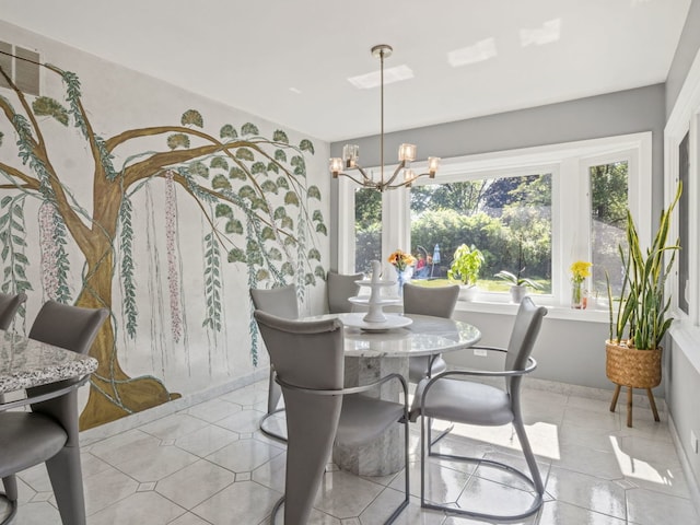 922 S School St, Mount Prospect, IL 60056 - dining area with a chandelier and baseboards