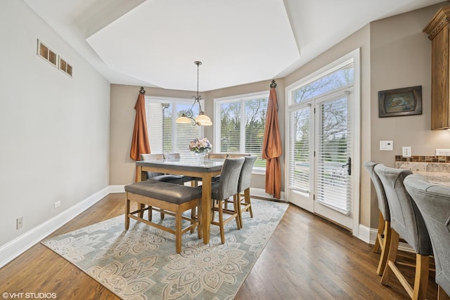 32W634 Oak Lawn Farm Rd, Wayne, IL 60184 - dining area featuring plenty of natural light, wood finished floors, and a chandelier