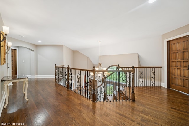 32W634 Oak Lawn Farm Rd, Wayne, IL 60184 - hallway with wood finished floors, a chandelier, recessed lighting, and arched walkways