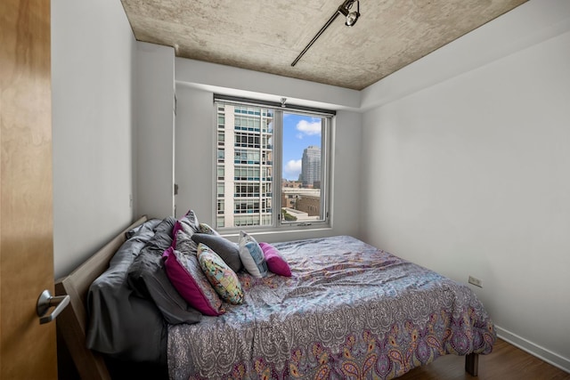 1845 S Michigan Ave Unit 701, Chicago, IL 60616 - bedroom featuring wood finished floors and baseboards