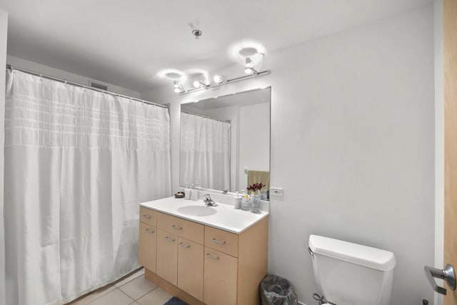 1845 S Michigan Ave Unit 701, Chicago, IL 60616 - bathroom with vanity, tile patterned floors, and a shower with curtain