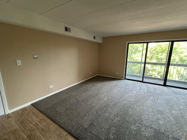 15137 Quail Hollow Dr Unit 203, Orland Park, IL 60462 - spare room with baseboards and dark wood-style floors