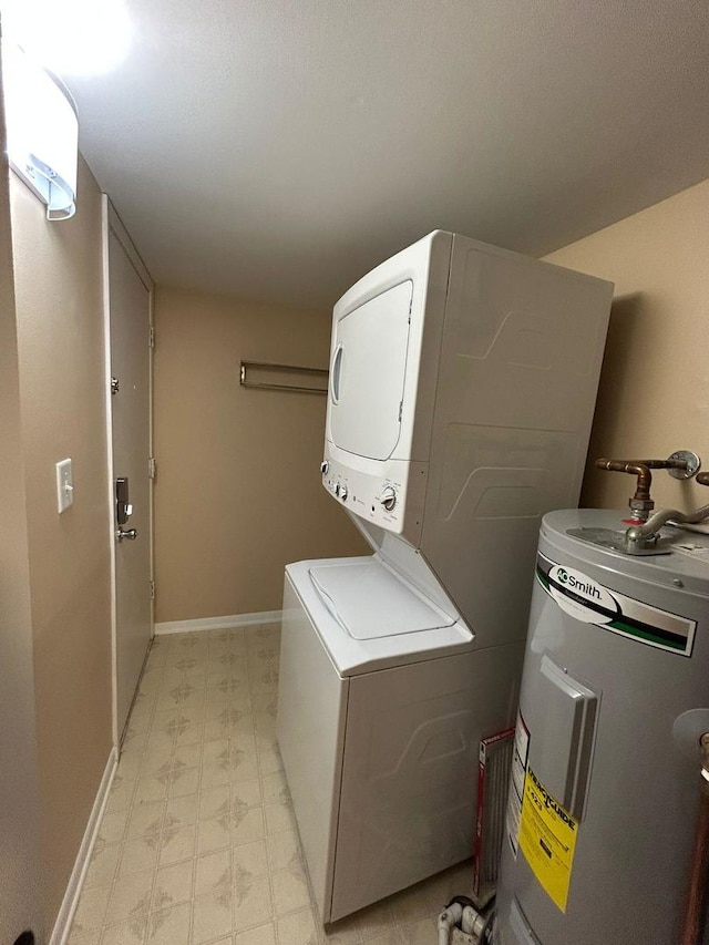 15137 Quail Hollow Dr Unit 203, Orland Park, IL 60462 - laundry room featuring water heater, stacked washer / drying machine, an AC wall unit, and light flooring