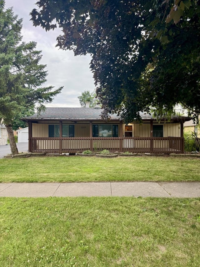 5125 W 101st St, Oak Lawn, IL 60453 - ranch-style home with a front yard and a chimney