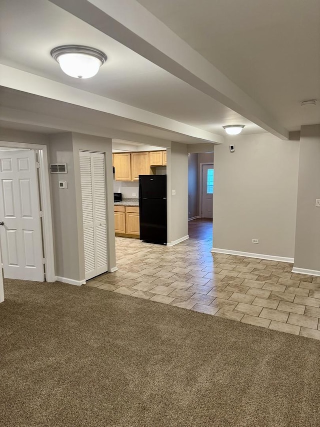 5125 W 101st St, Oak Lawn, IL 60453 - unfurnished living room featuring baseboards and light colored carpet