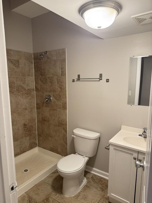 5125 W 101st St, Oak Lawn, IL 60453 - bathroom with vanity, a tile shower, and tile patterned flooring