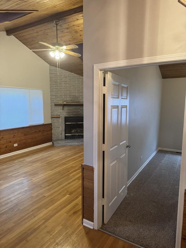 5125 W 101st St, Oak Lawn, IL 60453 - unfurnished living room with ceiling fan, wood finished floors, wooden ceiling, and a fireplace