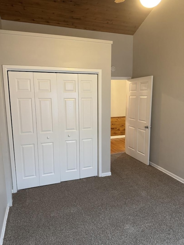 5125 W 101st St, Oak Lawn, IL 60453 - unfurnished bedroom featuring dark colored carpet, wooden ceiling, and a closet