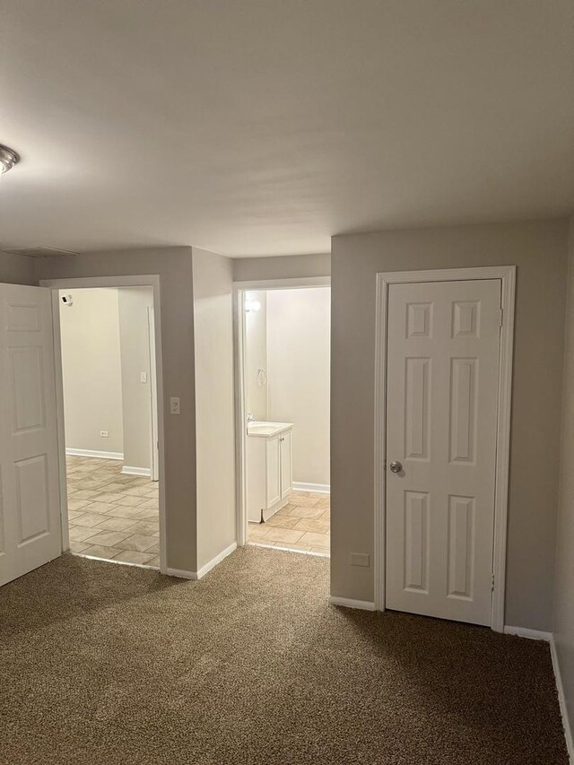 5125 W 101st St, Oak Lawn, IL 60453 - unfurnished room featuring light carpet and baseboards