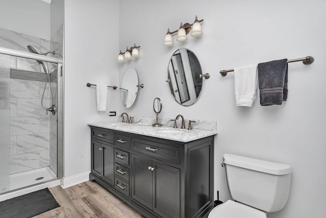 26226 W Tallgrass Trl, Channahon, IL 60410 - full bath with double vanity, a shower stall, and wood finished floors
