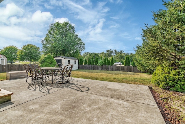 26226 W Tallgrass Trl, Channahon, IL 60410 - fenced backyard with a shed, outdoor dining space, and a patio