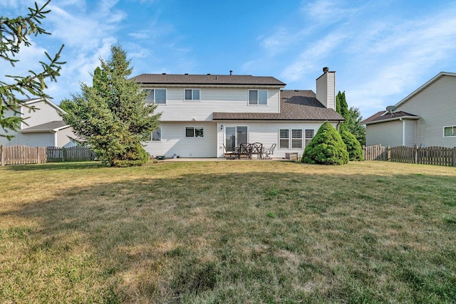 26226 W Tallgrass Trl, Channahon, IL 60410 - back of property with a chimney