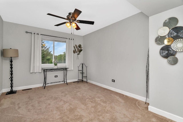 26226 W Tallgrass Trl, Channahon, IL 60410 - carpeted spare room with a ceiling fan and baseboards