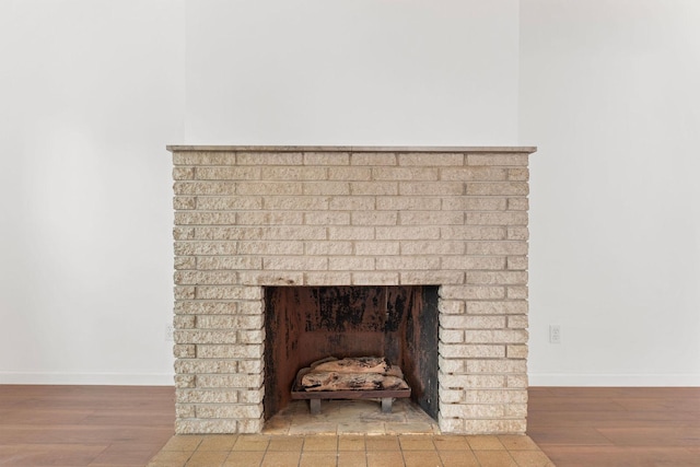 1063 S 8th Ave, Kankakee, IL 60901 - detailed view of wood finished floors and a fireplace