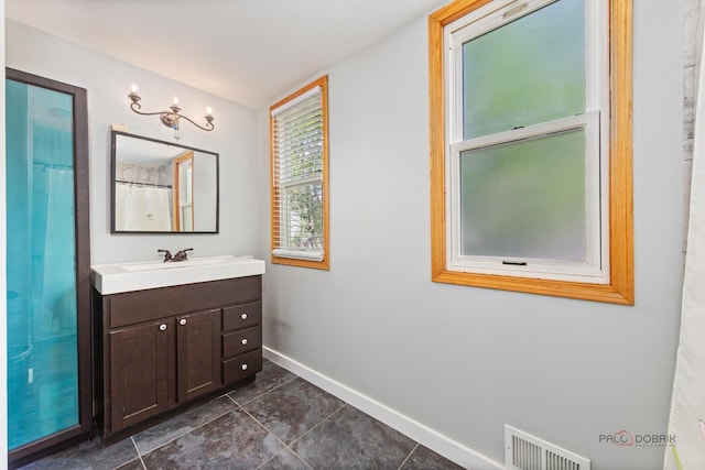 2800 Auxplaines Ave, River Grove, IL 60171 - bathroom featuring vanity and tile patterned flooring