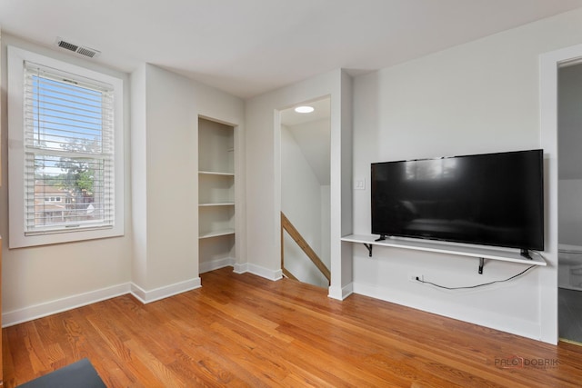 2800 Auxplaines Ave, River Grove, IL 60171 - unfurnished living room featuring light wood finished floors and baseboards