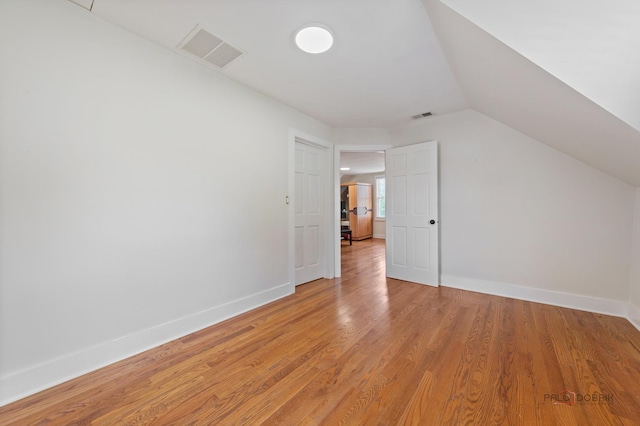 2800 Auxplaines Ave, River Grove, IL 60171 - additional living space with vaulted ceiling and light wood-type flooring