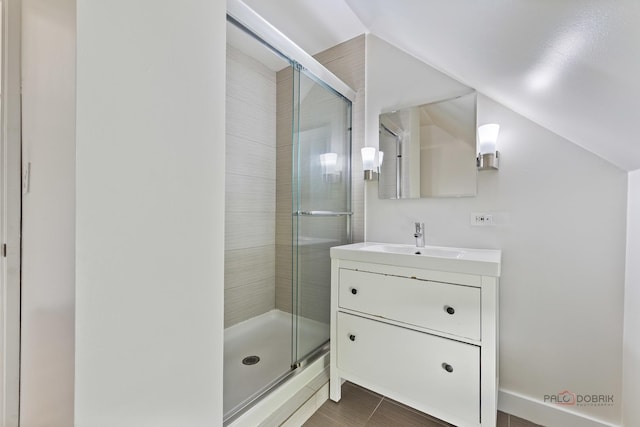 2800 Auxplaines Ave, River Grove, IL 60171 - bathroom featuring lofted ceiling, a stall shower, vanity, and tile patterned floors