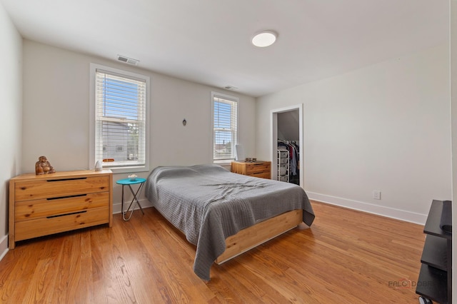 2800 Auxplaines Ave, River Grove, IL 60171 - bedroom featuring light wood-type flooring and a spacious closet