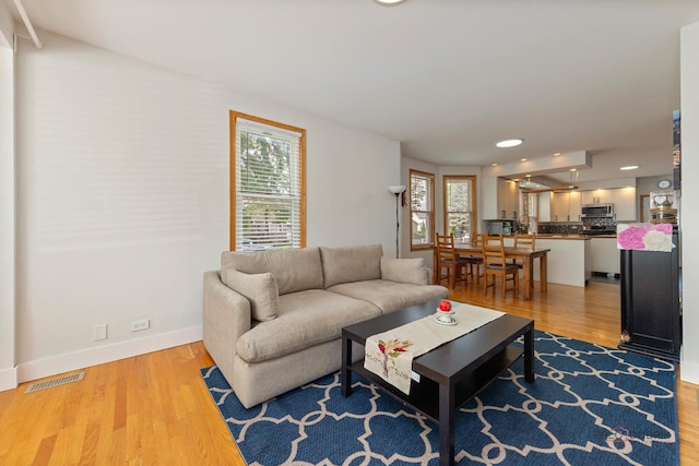 2800 Auxplaines Ave, River Grove, IL 60171 - living area featuring healthy amount of natural light, light wood finished floors, and recessed lighting