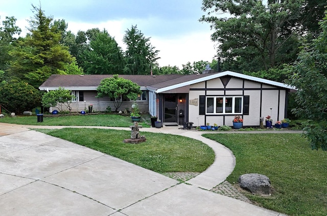 1108 Plaza Dr, New Lenox, IL 60451 - ranch-style house with a front yard and stucco siding